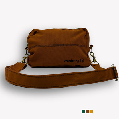 Wander-Lightly Pouch with detachable strap for use as a crossbody or a clutch in clay brown. Variant colour swatches shown here also