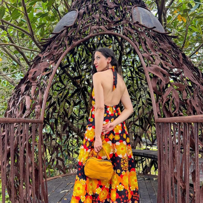 Wandering Sol Crossbody being used as a clutch in Wattle Yellow